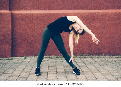 Woman Stretching Pro Or Post Workout