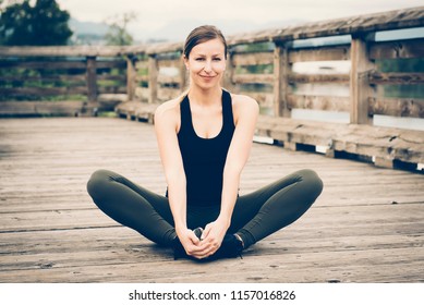 Woman Stretching Pro Or Post Workout