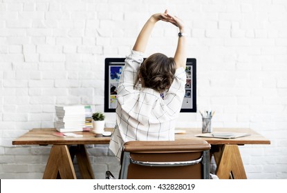 Woman Stretching Relaxation Resting Office Workplace Concept - Powered by Shutterstock