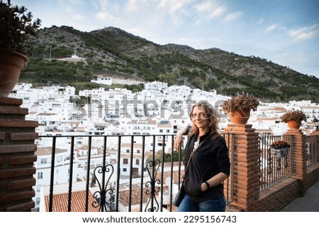 woman strolling in picturesque village of  Mijas. Costa del Sol  Andalusia  Spain