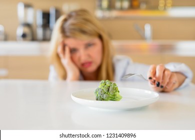 Woman Struggling With Her Diet