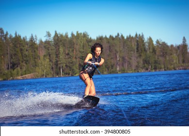 Woman Study Wakeboarding On A Lake