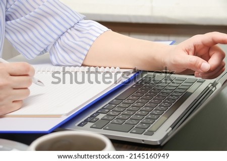 Woman studying in front of computer