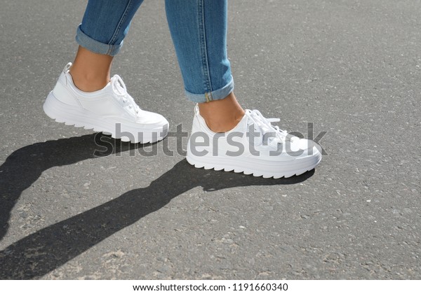 Woman Stylish Sneakers Walking Outdoors Focus Stock Photo (Edit Now ...