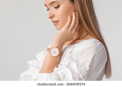 Woman With Stylish Wrist Watch On White Background