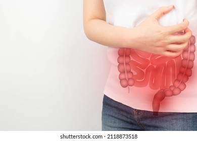Woman suffering from abdominal pain with small and large intestines organ shape. Digestive tract problems include colitis, IBS or colon cancer. Colorectal disease awareness concept.
