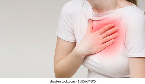 Woman Suffering From Acid Reflux Or Heartburn, Symptomatic Indigestion Or Gastritis Disease, Panorama