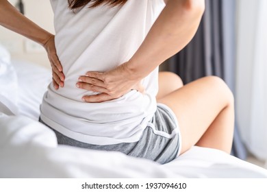 Woman Suffering From Back Ache On The Bed, Healthcare And Problem Concept