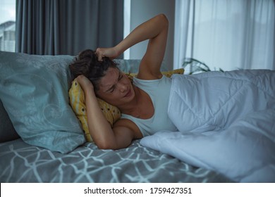 Woman Suffering From Depression Laying On Bed, Bed , Sleep Disorders, Insomnia. Depressed Woman Awake In The Night, She Is Exhausted And Suffering From Insomnia