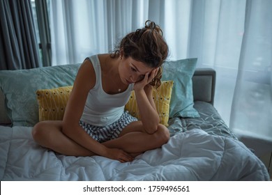 Woman Suffering From Depression Laying On Bed, Bed , Sleep Disorders, Insomnia. Depressed Woman Awake In The Night, She Is Exhausted And Suffering From Insomnia