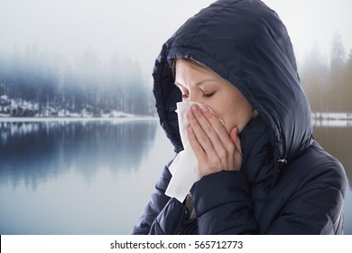 Woman Suffering From Flu, Cold, Sneezing Outdoors. Health Care And Medical Concept