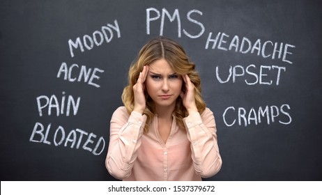 Woman suffering headache due to imaginary problems in pms, hormone imbalance - Shutterstock ID 1537379672