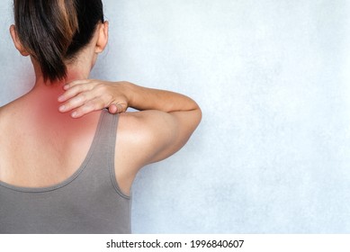 A Woman Suffering From Neck Pain And Massaging Her Neck To Releive Pain, Neck Pain Relief Exercises