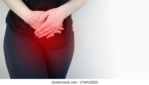 A woman suffers from pain in the pelvic organs. The gynecologist examines the patient. Painful location, female disease, cystitis, or urinary incontinence