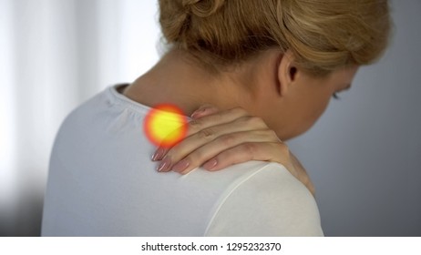 Woman Suffers From Shoulder Ache, Osteoarthritis, Spot Indicates Muscle Pain