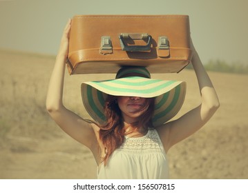 Woman With Suitcase