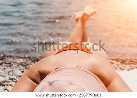 Similar – Image, Stock Photo Tranquil woman sunbathing in lounger on beach