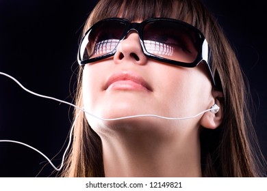 Woman In Sunglasses Listening Walkman.