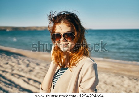 woman in sunglasses on the beach summer holiday                     
