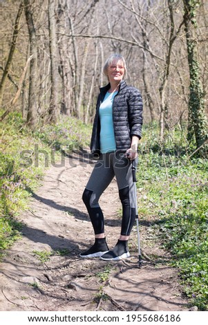 Similar – Porträt einer jungen Frau geht als Training nach draußen.