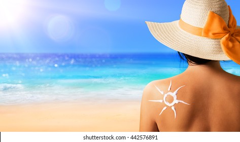 Woman With Suntan Lotion Shaped Sun
