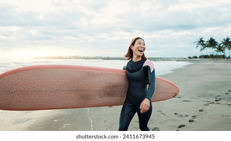 Woman, surfing board and laughing at beach, sea and ocean for summer holiday, travel adventure or hobby. Happy Japanese surfer excited for water sports, freedom or fun for tropical vacation on island - Powered by Shutterstock