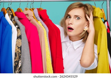 woman surprised while browsing colorful clothing rack full of vibrant attire. fashion choices overwhelm in retail, shopping, style exploration. captures modern wardrobe decisions
