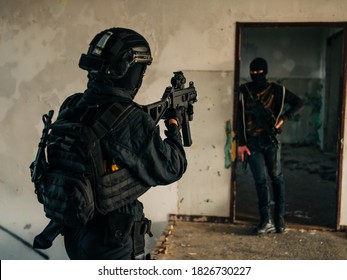 Woman Swat Police Officer Arresting A Criminal Guy With A Gun.