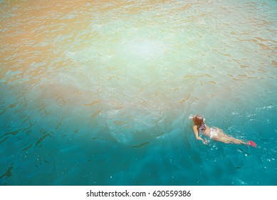 Woman Swiming In The Sea