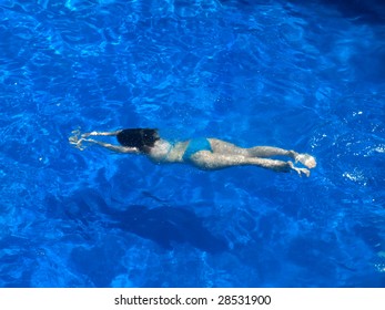 Woman Swiming Underwater