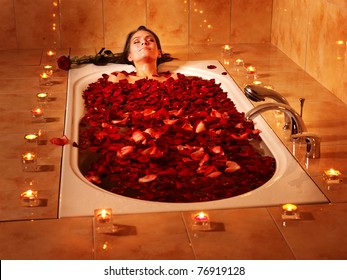 Woman swimming of bath tub. - Powered by Shutterstock