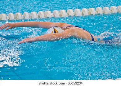 woman swimming during a competition