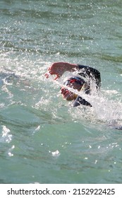 Woman Swimming In A River, Open Water Competition, Triathlon.