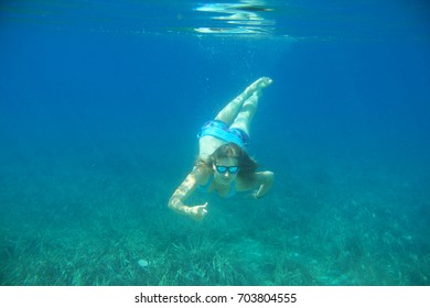 Woman Swimming Underwater Blue Transparent Sea Stock Photo 703804555