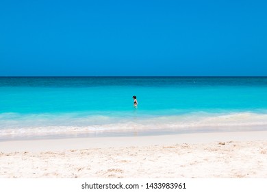 Woman Swimming In The Waters Of Rosario Islands Colombia