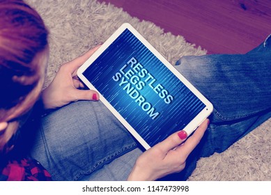 A Woman, A Tablet PC And Restless Legs Syndrome