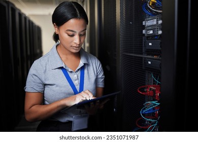 Woman, tablet and server room, programming or coding for cybersecurity, information technology or data protection backup. Engineering person on digital software, hardware inspection or basement check - Powered by Shutterstock - Get 15% off with code: PIKWIZARD15