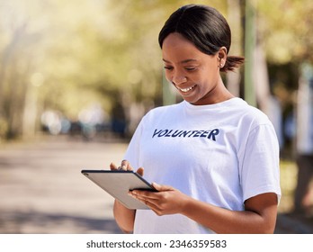 Woman, tablet and volunteering in park on social media FAQ, blog or community service website. African person on digital technology for earth day information, NGO or nonprofit sign up in nature