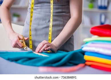 Woman Tailor Working On A Clothing Sewing Stitching Measuring Fa