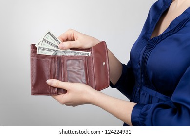 Woman Take Dollar Money Out From Wallet.