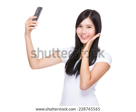 Similar – Young asian woman taking photo with her smartphone