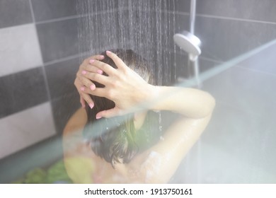 Woman Takes Hot Shower In Bathroom. Power And Benefits Of Contrast Shower Concept