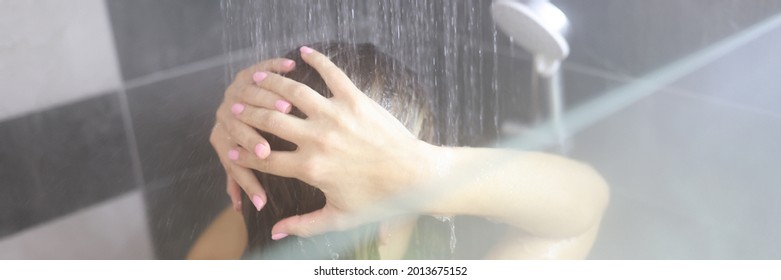 Woman Takes Hot Shower In Bathroom Closeup