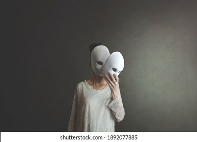 woman takes off the mask from her face but underneath her she has another mask, concept of hiding one's soul and oneself