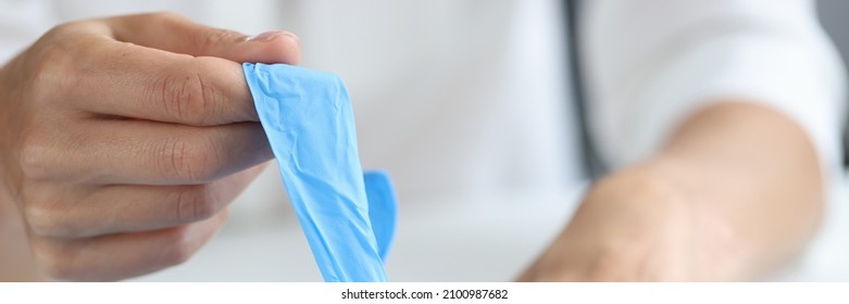 Woman Takes Out Disposable Gloves From Box. Hand Hygiene And Use Of Gloves Concept