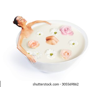 Woman Taking A Bath In Scented Milk