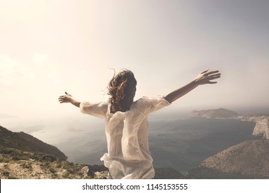 Woman Taking A Breath In Front Of A Spectacular View