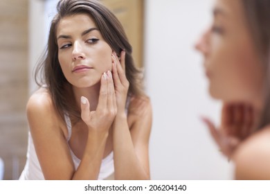 Woman Taking Care Of Her Skin 