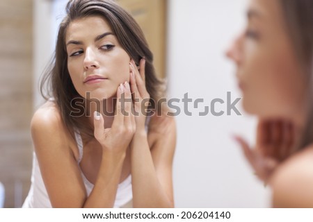 Woman taking care of her skin 