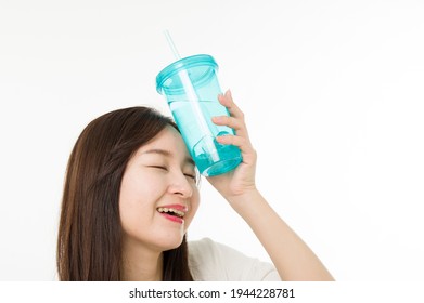 Woman Taking A Cool Off With Cold Water